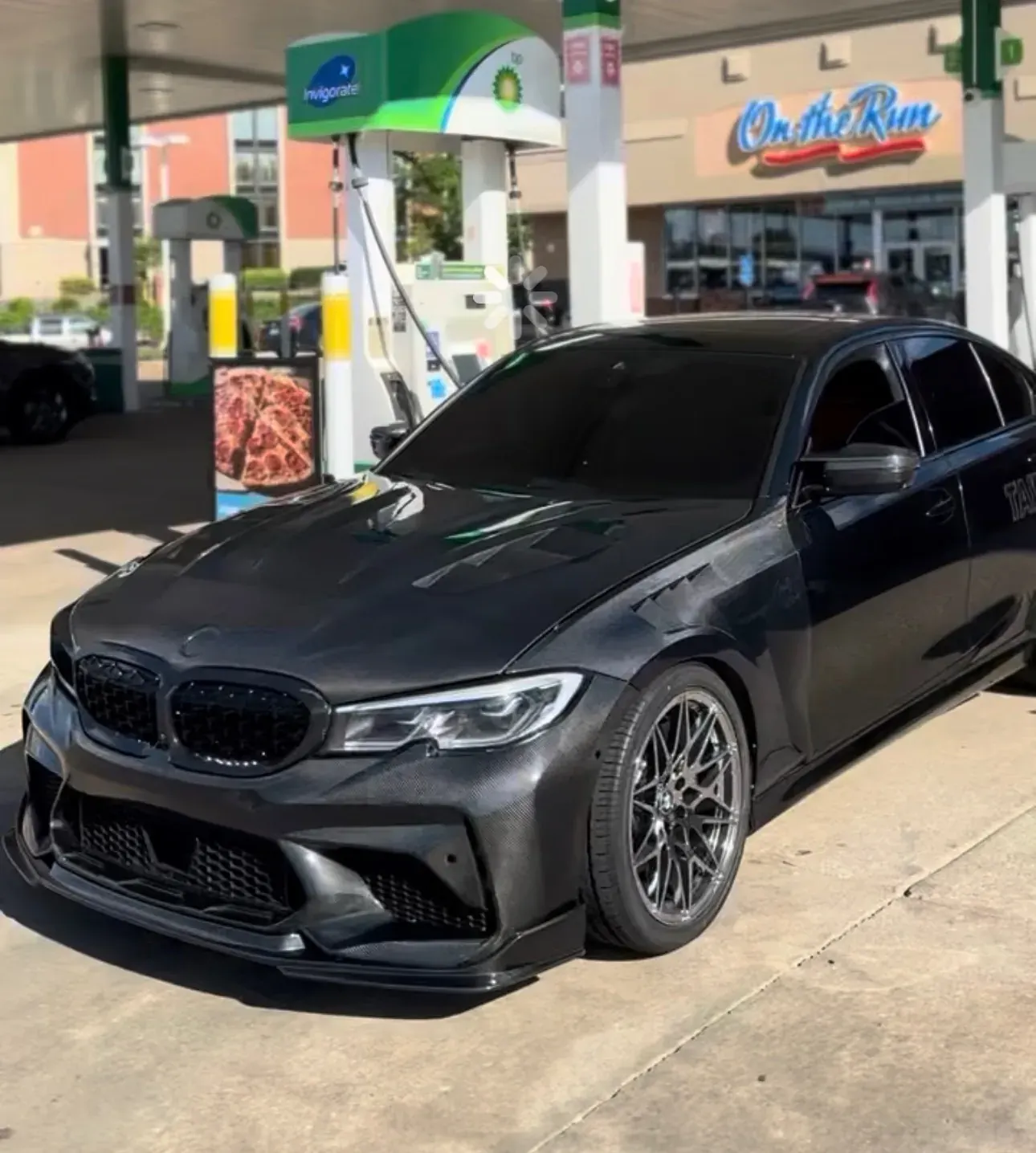M340i front three-quarter with carbon hood