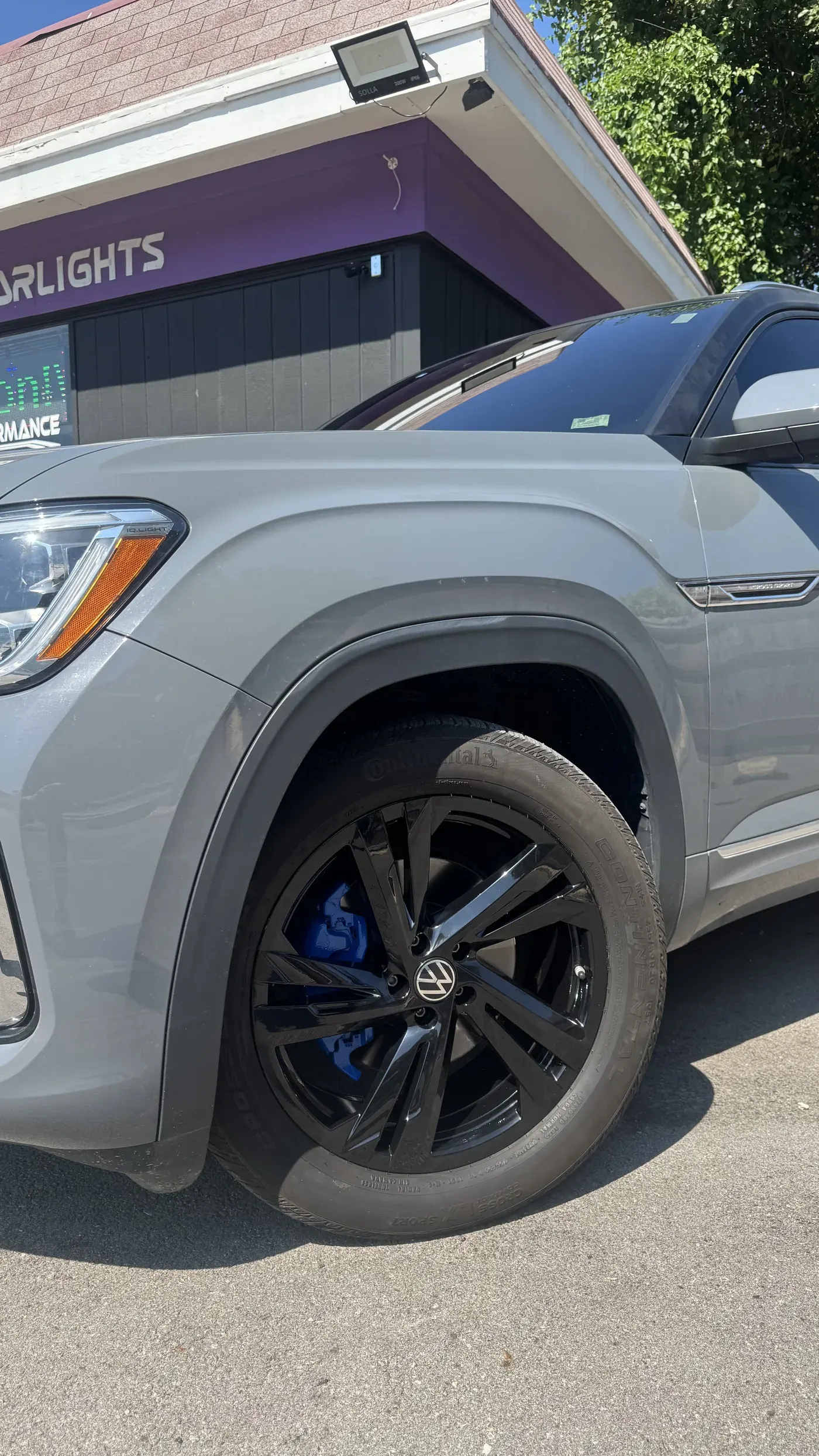 Silver SUV with powder coated black wheels