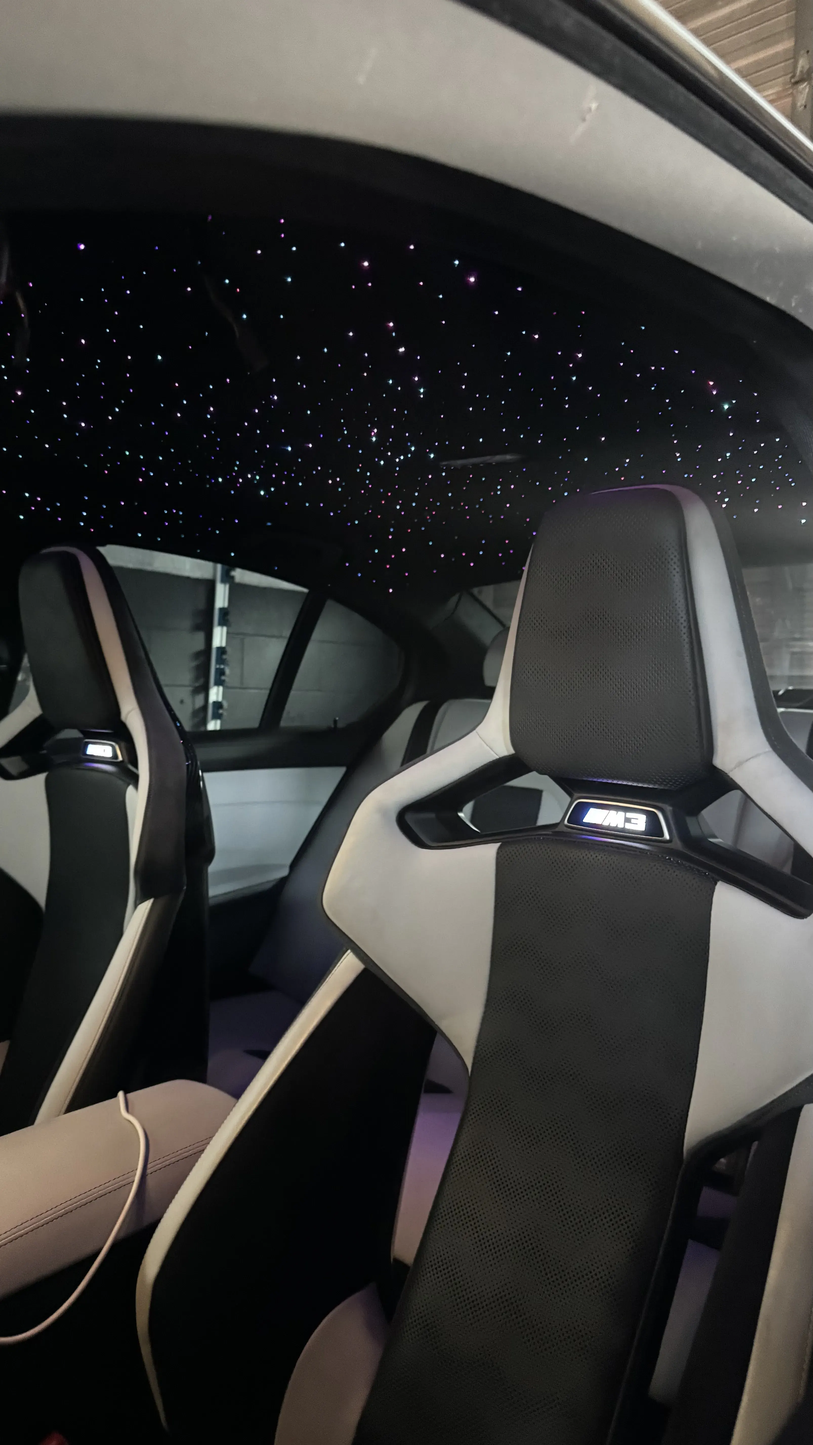 Starlight headliner above BMW seats