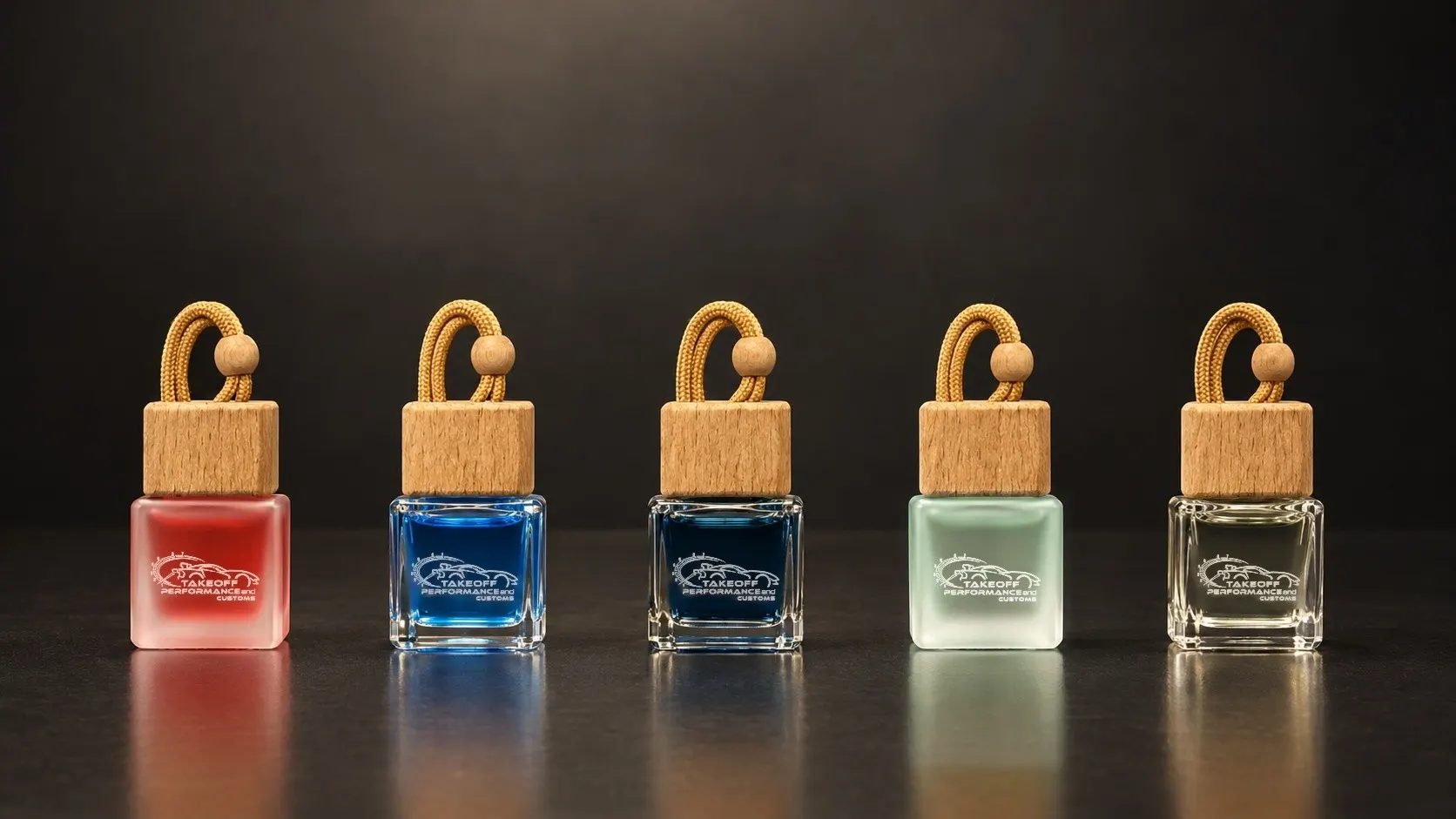 Five Takeoff scent bottles lined up